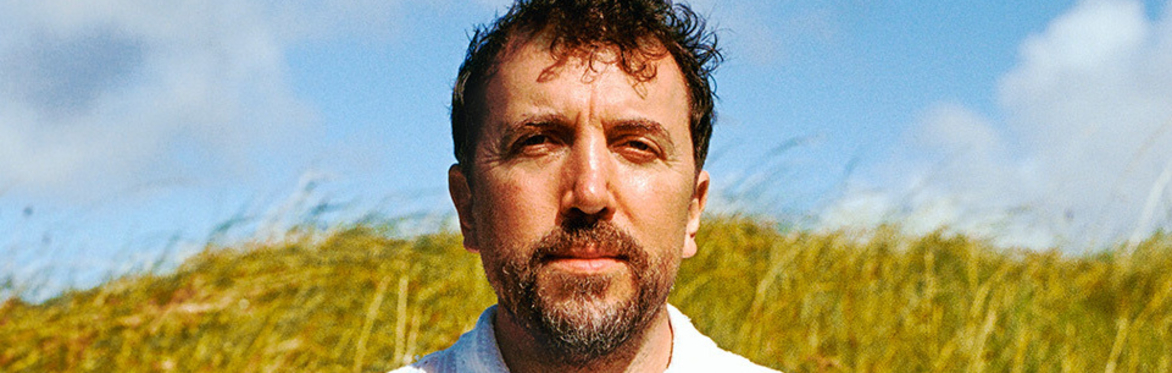 A picture of a man in a field