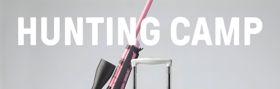 A pink camouflage suitcase and rifle.