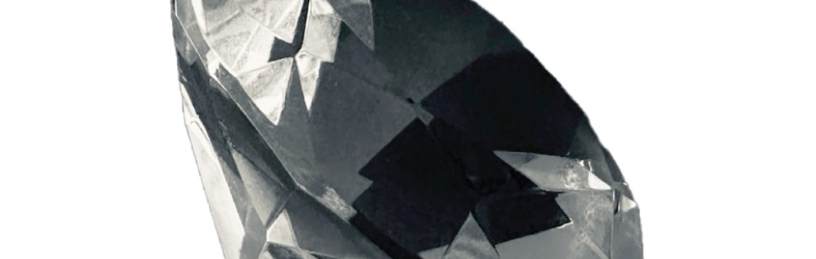 A diamond reflecting a dark image.