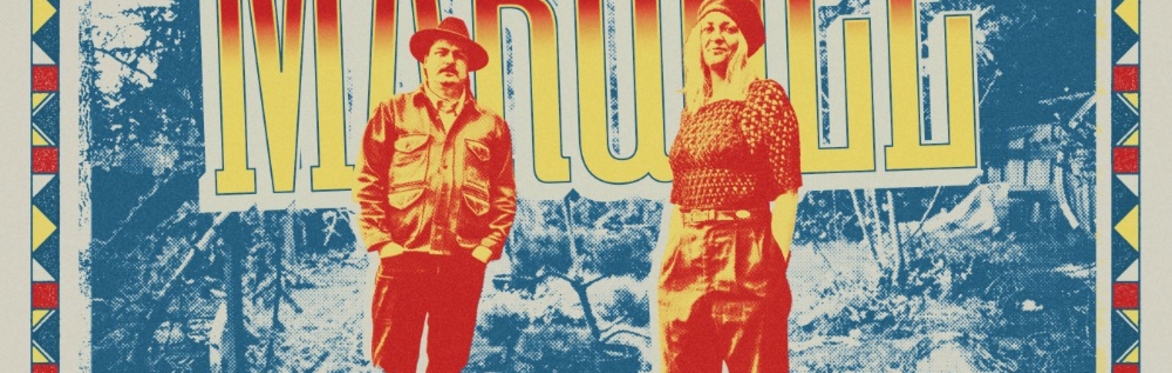 A.W. Cardinal and Jasmine Colette of Blue Moon Marquee standing proudly amongst trees. Tour dates and city names for Blue Moon Marquee appearing in Washington, Oregon and California in April 2026