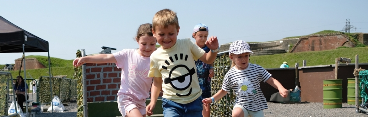 Four children on assault course
