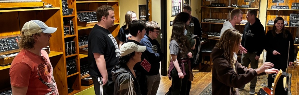 A group of visitors touring MMT