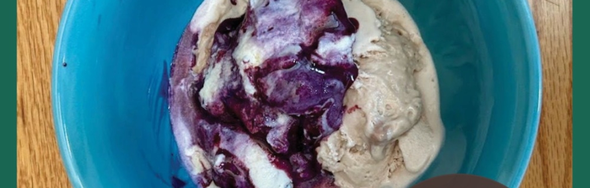 A bowl of ice cream, along with a sticker that reads "Celebrate Organic Dairy"