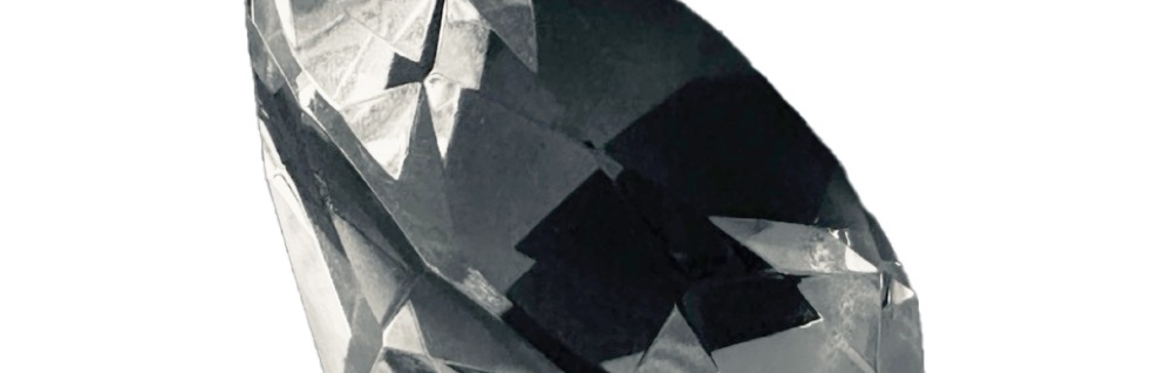 A diamond reflecting a dark image.