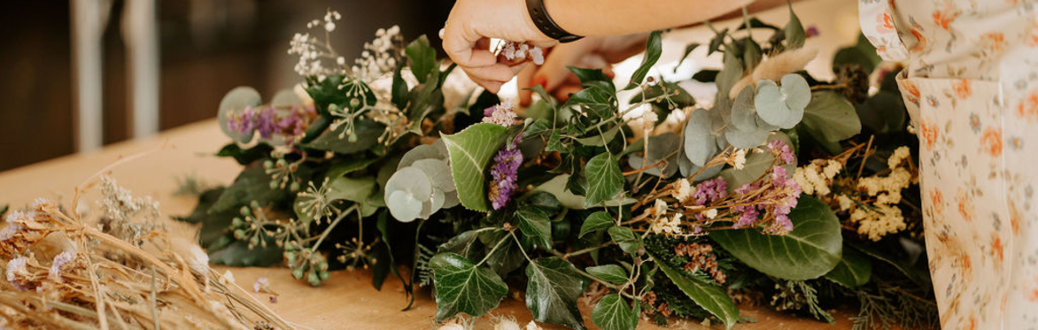 A work in progress Christmas wreath being made.