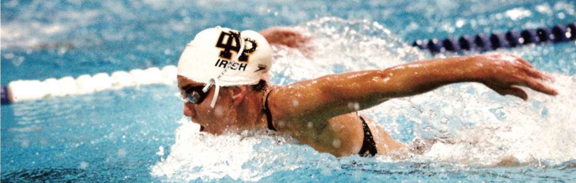 Swimmer in the pool swimming butterfly