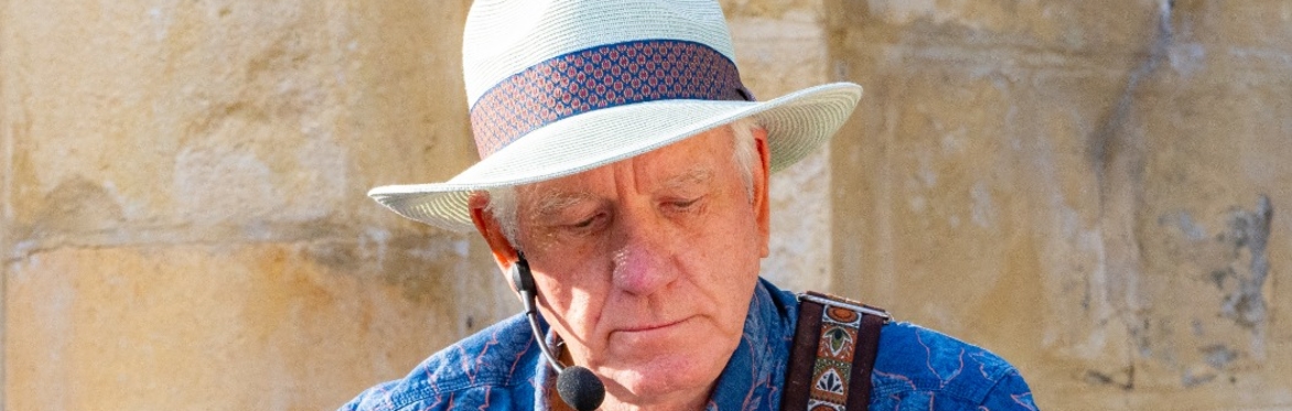 Head shot of singer with microphone