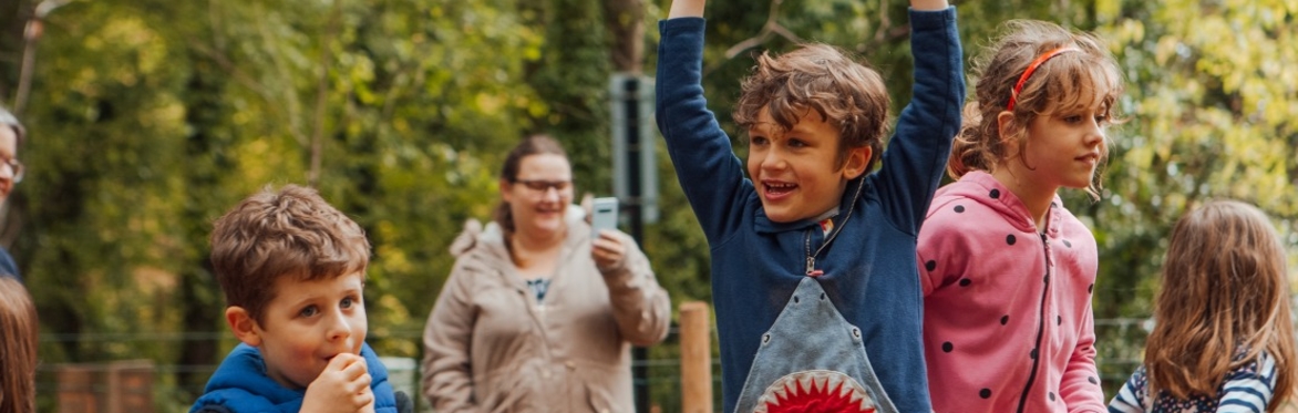 Happy children in woodland