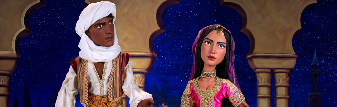 Marionettes dressed up in Arabian garb.