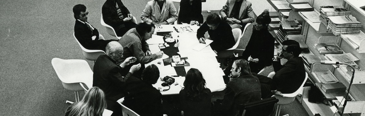 This is an archival image of Artist Placement Group's 'The Sculpture' installation, with participants, at Between 6, Städtische Kunsthalle Düsseldorf, 15–17 June 1971.