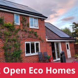 Detached house with solar panels, text - Open Eco Homes
