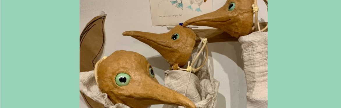 Work-in-progress seagull puppets, thermo-plastic faces, reed and cloth bodies, sea green eyes
