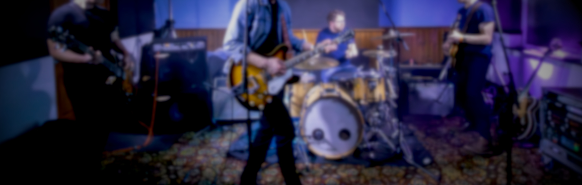 A band mid set with dramatic lighting