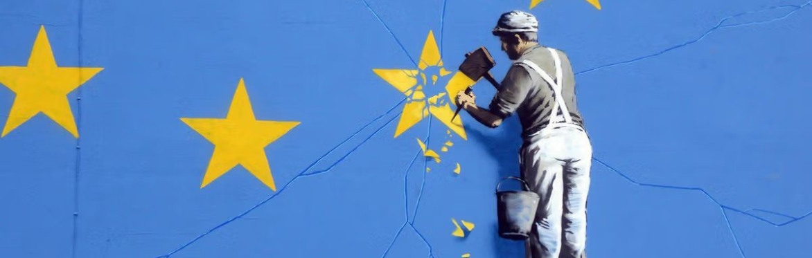 Banksy - workman chipping away at a star on the European flag