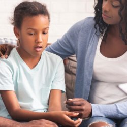 Family in therapy talking together