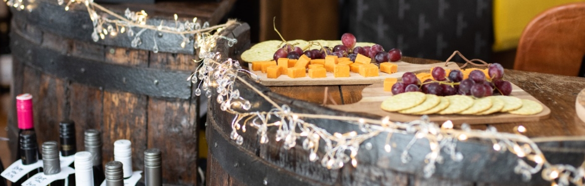 cheese and grapes on a counter