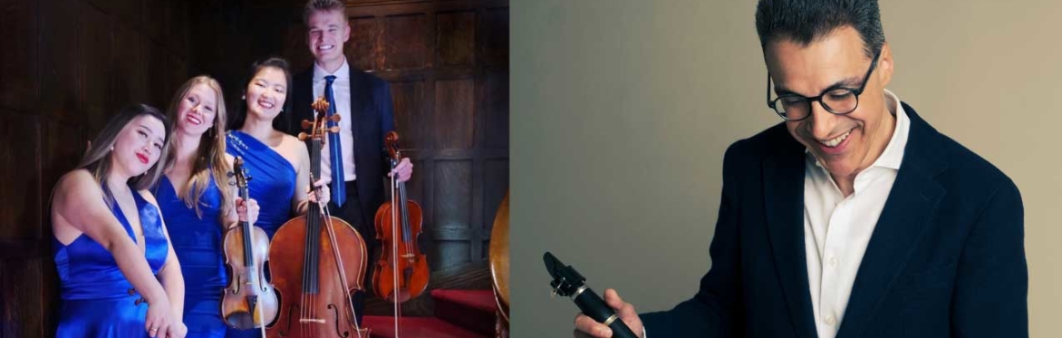 People stand with musical instruments on a set of stairs.