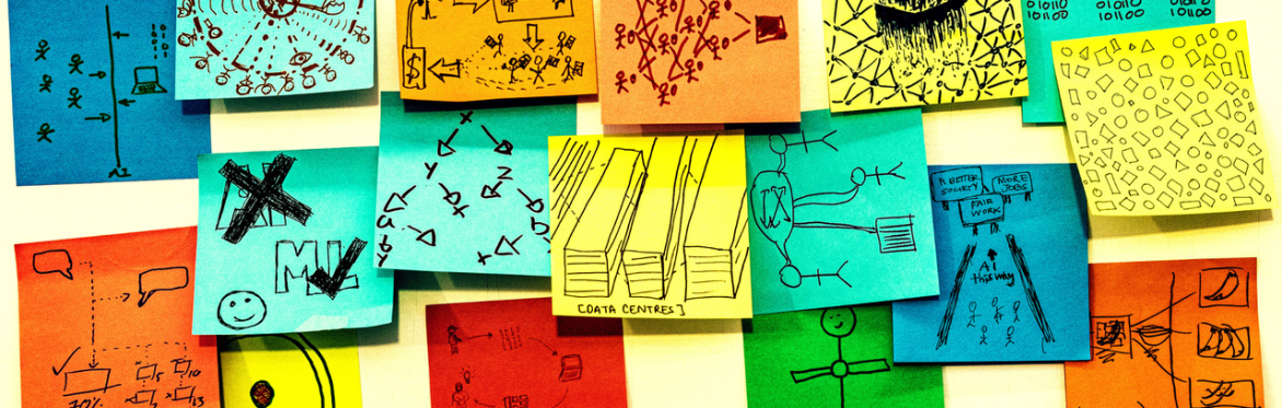 Seventeen multicoloured post-it notes are roughly positioned in a strip shape on a white board. Each one of them has a hand drawn sketch in pen on them, answering the prompt on one of the post-it note