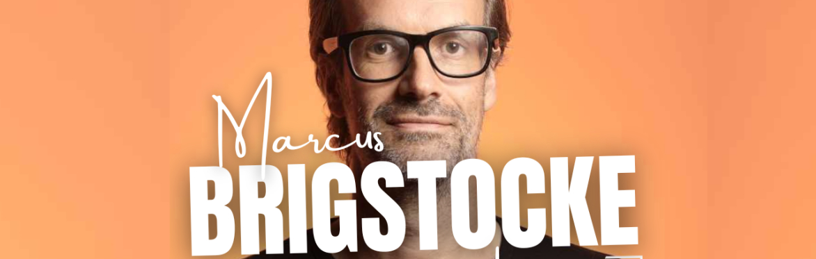 Marcus Brigstocke looking at the camera