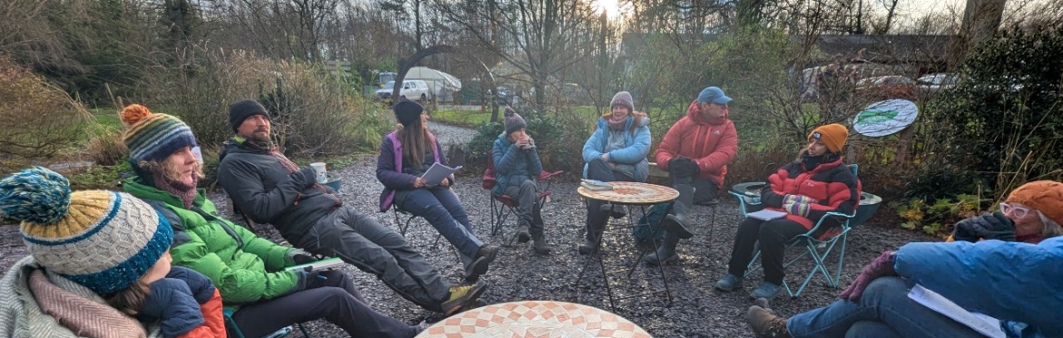 Workshop participants sharing in a circle. Photo credit Mike Raine.