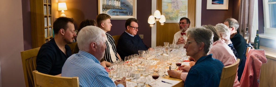 ound table tasting wines with notes and maps