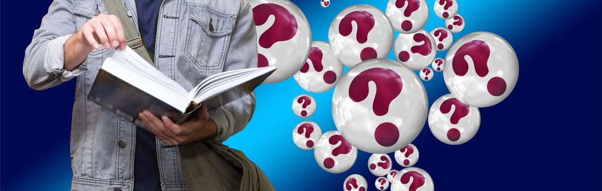 person reading book with question mark bubbles all around them