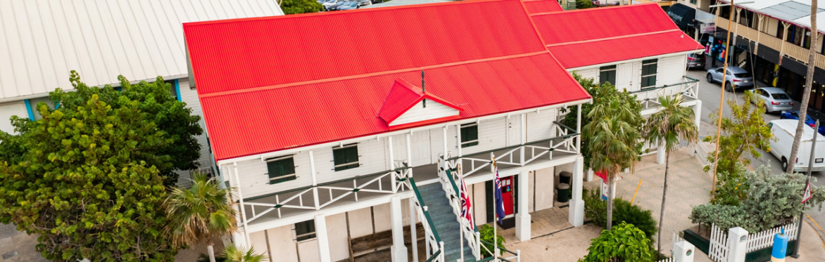 Cayman Islands Museum, red roof with white timber.