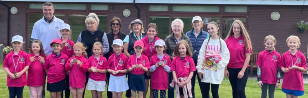 Smiling girls enjoying the Girl's Hub at Bearsden Golf Club