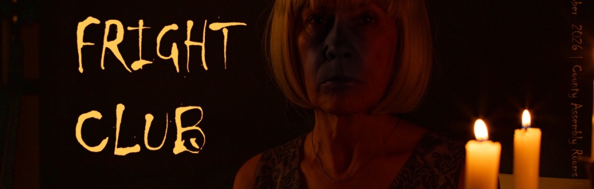A vampire in the shadows at Fright Club