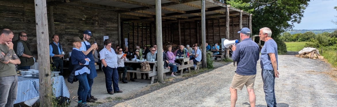 People gathered before a farm walk