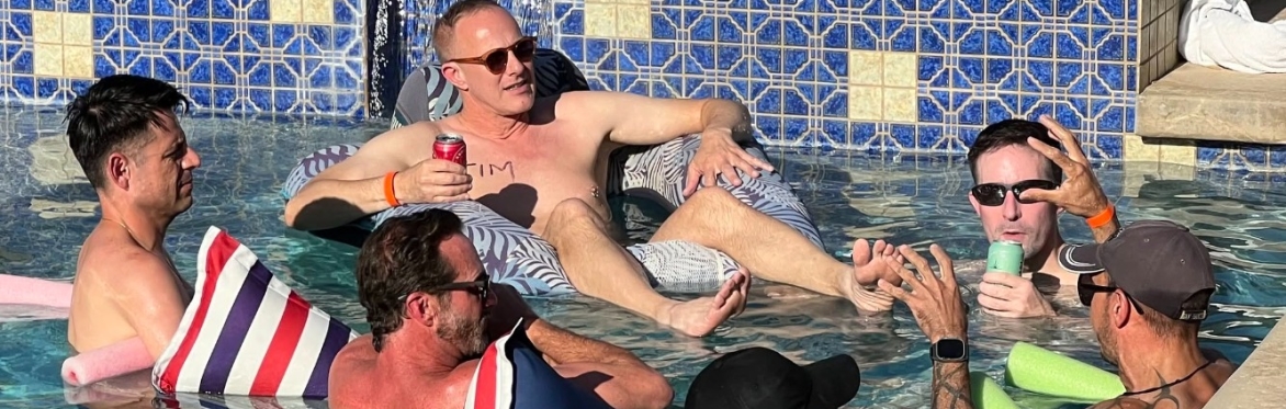 Men enjoying a pool party