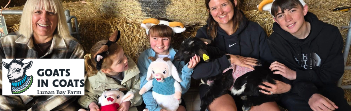 Happy visitors enjoying goat cuddles at Lunan Bay Farm