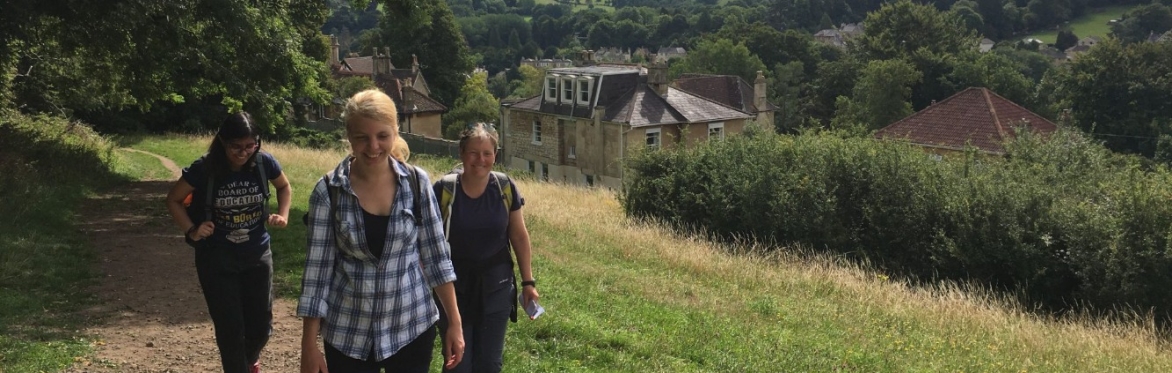 Photo of three people walking in Lyncombe Vale