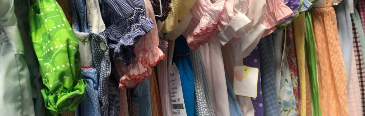 side view of lots of smocked clothing