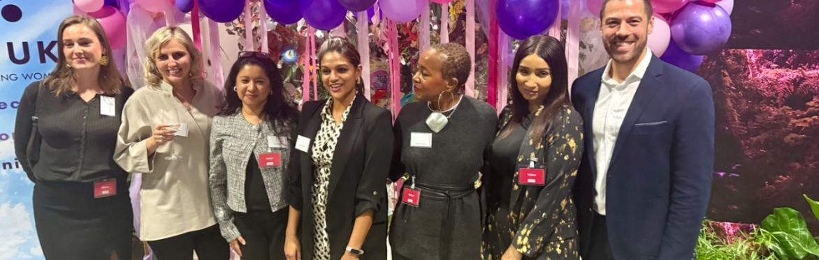 Ladies sat around table at networking event