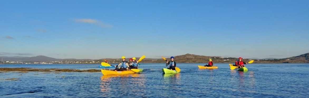 Kayaking with a blue sky in the background