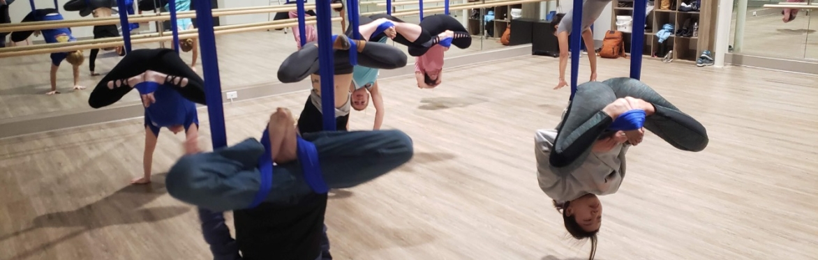 Group of people doing aerial flips