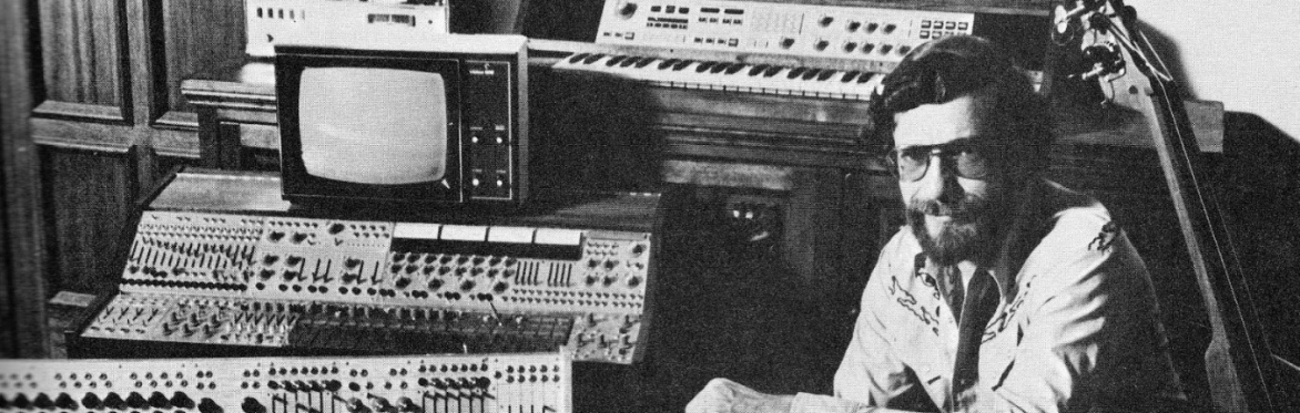 Don Buchla posting with some of his instruments