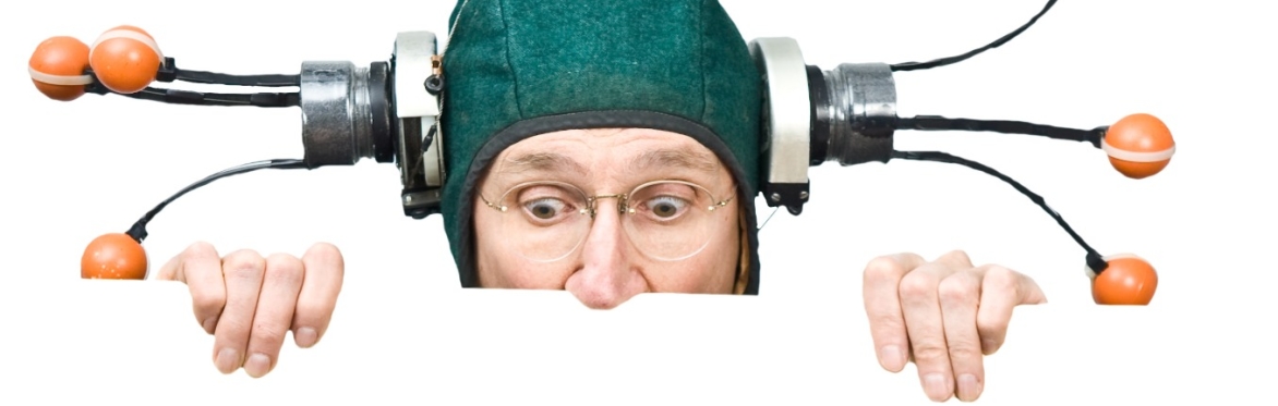 Al peeking over a wall wearing a silly hat