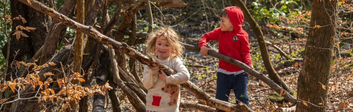 Children with large Sticks, photo taken by Eddie Sherwood