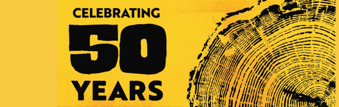 Partial cross-section of a tree trunk with 50 annual rings on a gold background, with black text "Celebrating 50 Years"