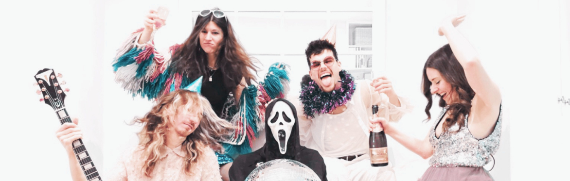 5 performers in party-style outfits celebrate on a sofa around a central figure dressed as death, wearing a black cloak and holding a disco ball. 21/06, 20:30- Jamboree, 27/06, 19:00- St John’s Hoxton