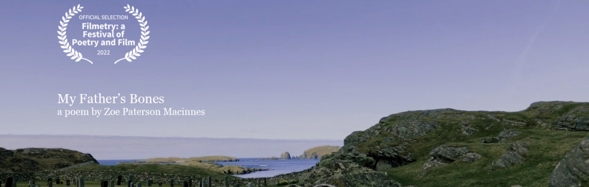 a graveyard with green hills and sea in the background