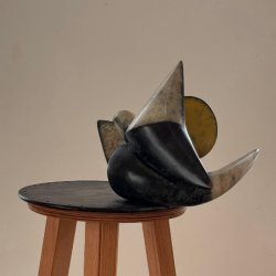 'Horned Hybrid', Chris Summerfield, Patinated Bronze 0n modelling stand. 2024. The stand is part of the piece.