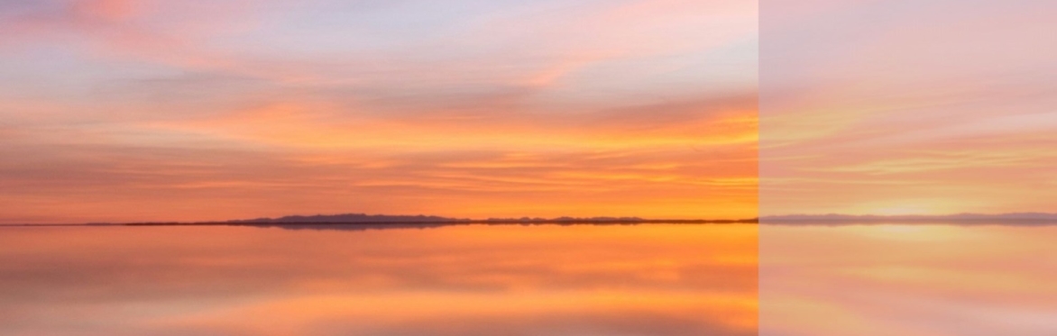 orange, pink sunset sky, reflected in a still lake