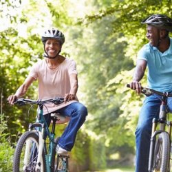 Two people cycling