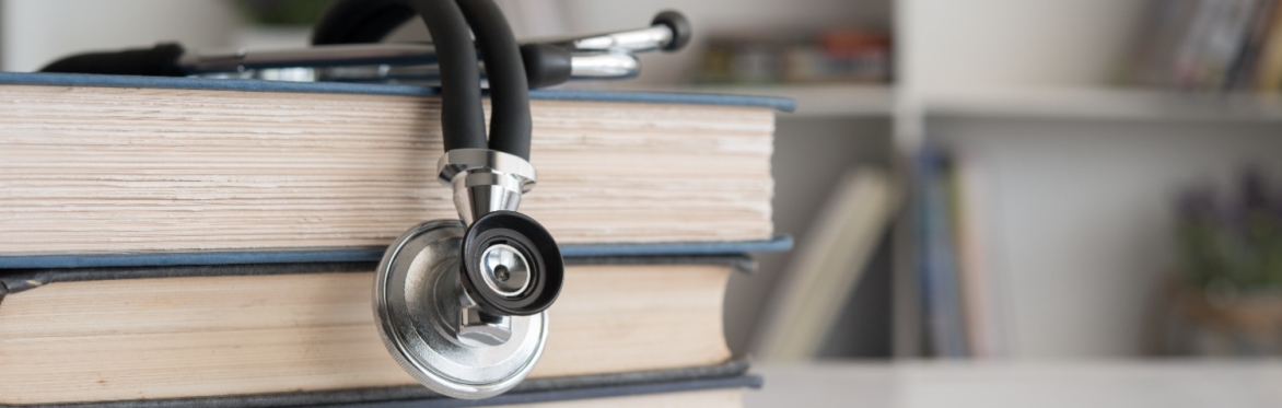 Books and stethoscope