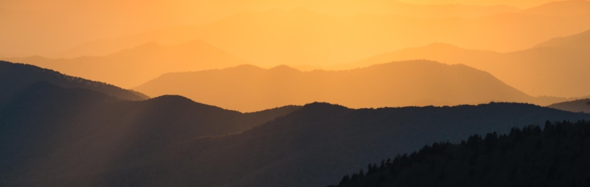 Mountain ridgelines at sunrise