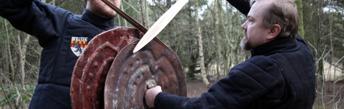 Two men with swords and shields