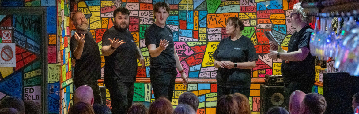 A crowd watching South Wales Improv Comedy